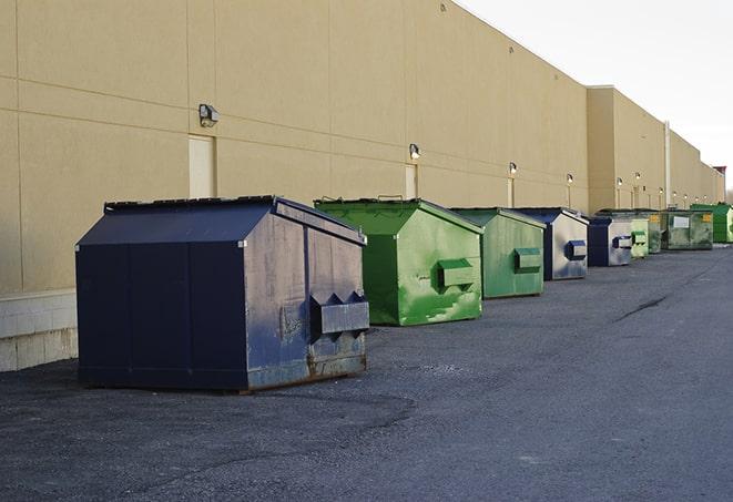 red and green waste bins at a building project in Church Hill